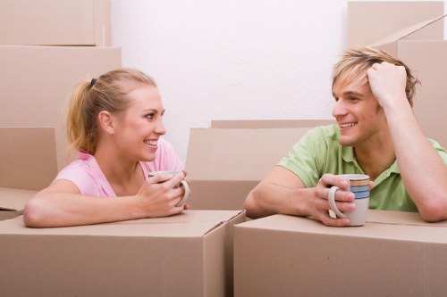Professional movers packing a house in Storage Sutton