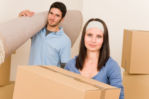 Professional movers handling furniture